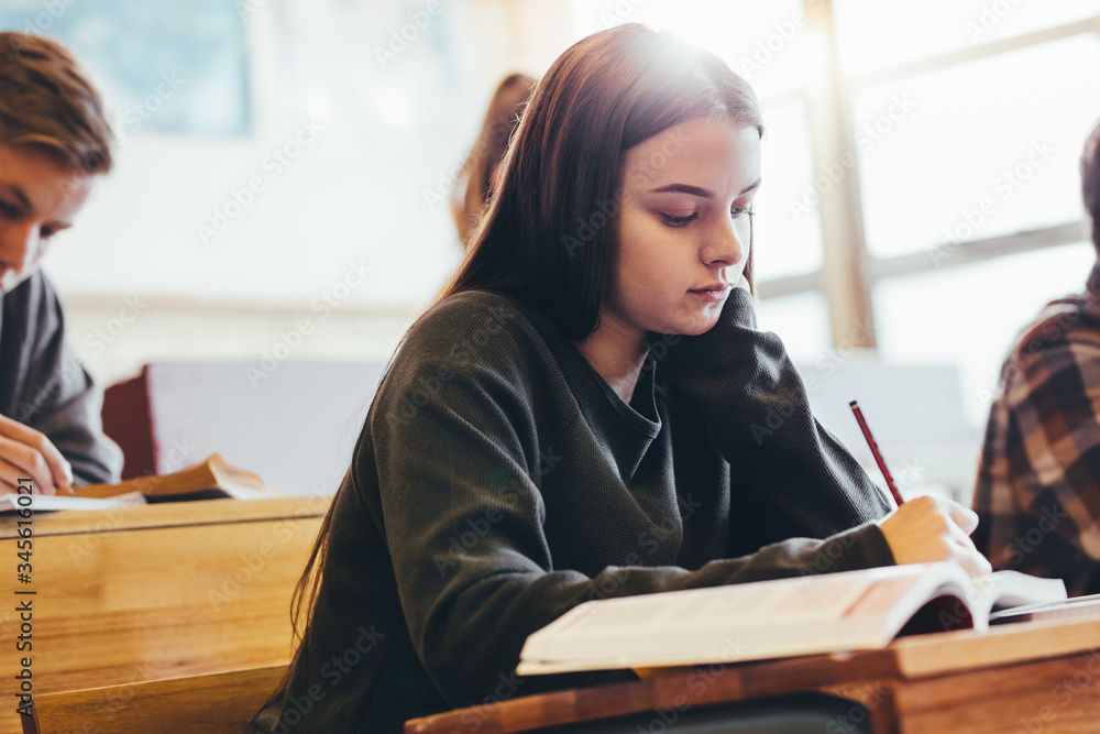 Female student in high school classroom