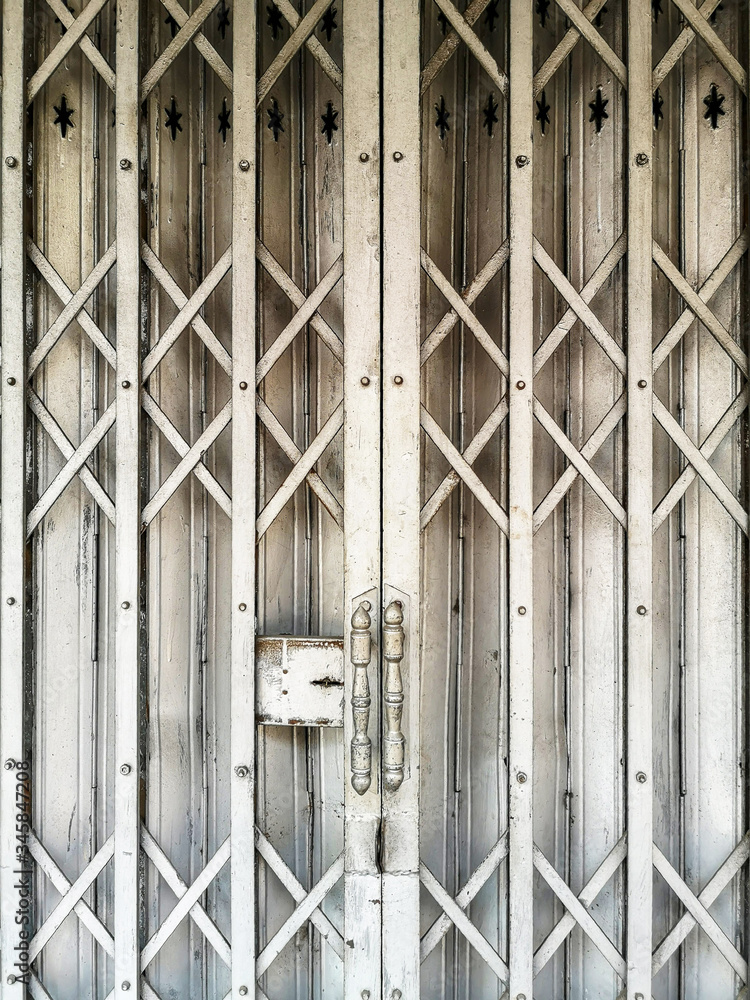 The old style steel door closed has been used for a long time.