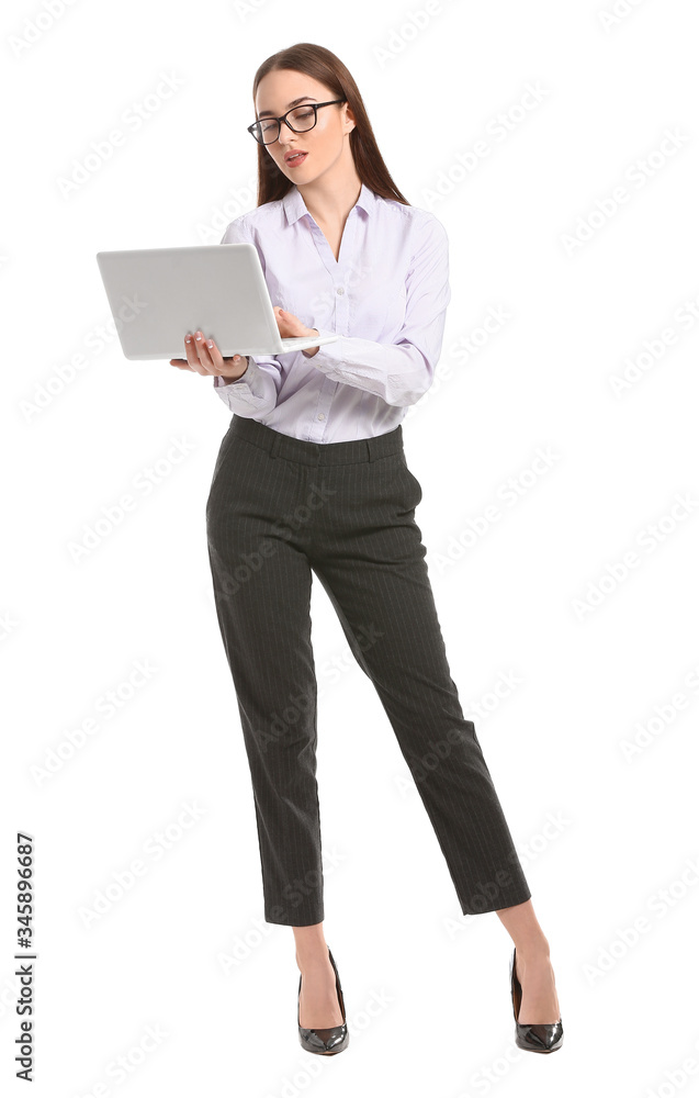 Beautiful young secretary with laptop on white background