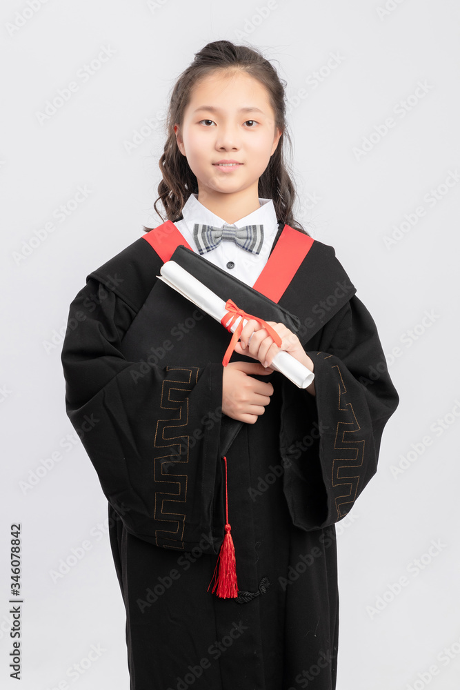 Asian primary school girls in bachelors suits