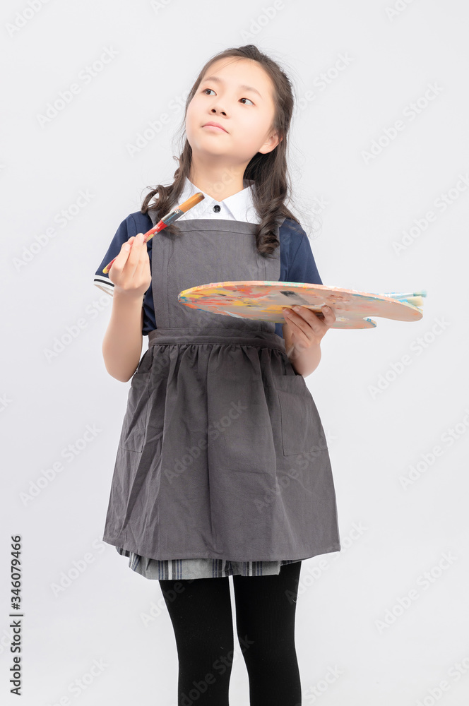 Asian primary school girls who are painting