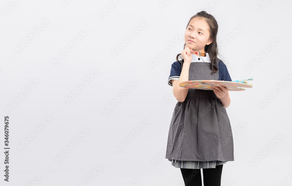 Asian primary school girls who are painting