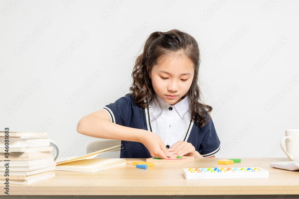 Asian primary school girls taking math classes