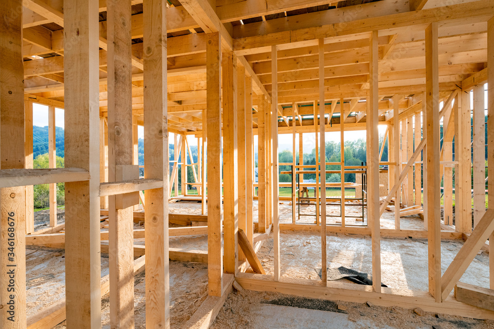 Interior frame of new wooden house under construction