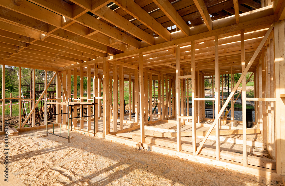 Interior frame of new wooden house under construction