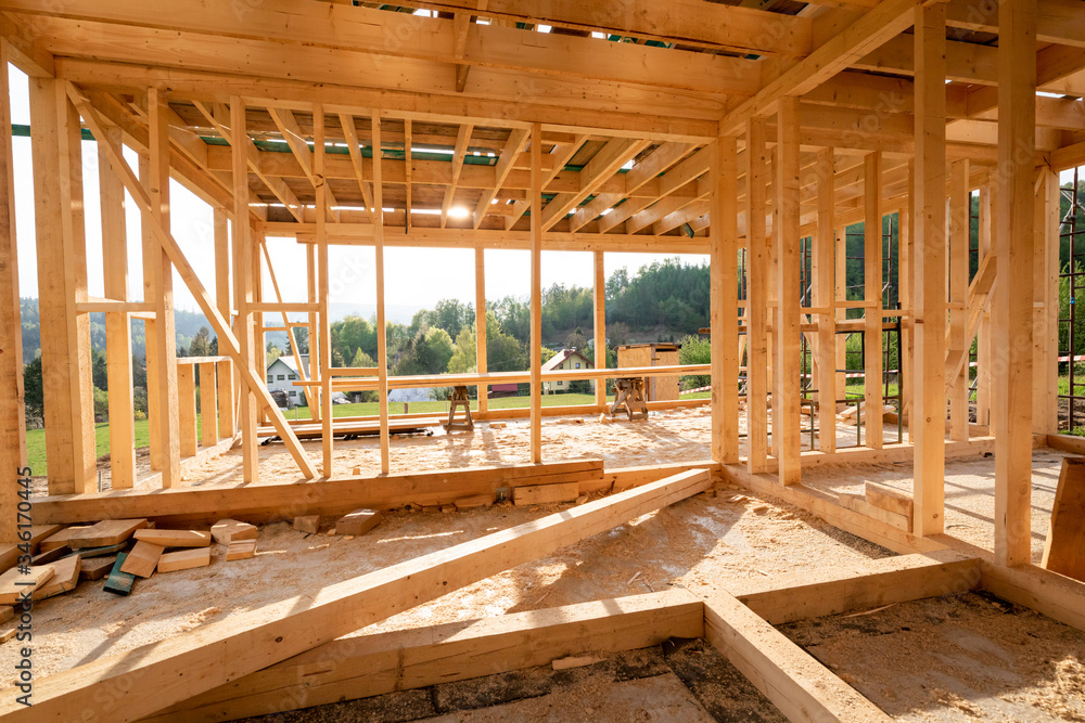 Interior frame of new wooden house under construction