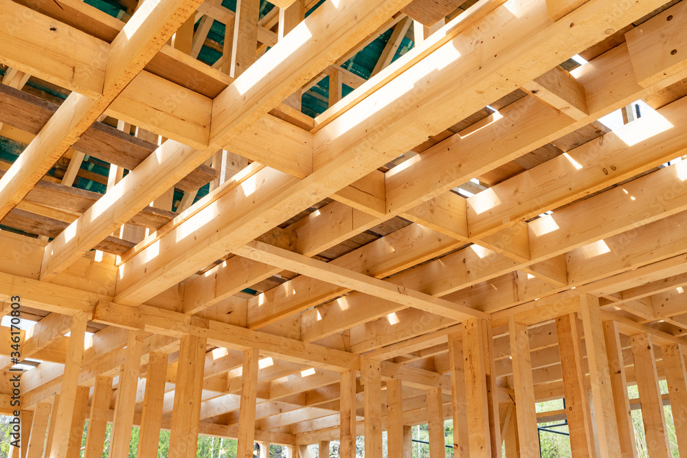 Interior frame of new wooden house under construction