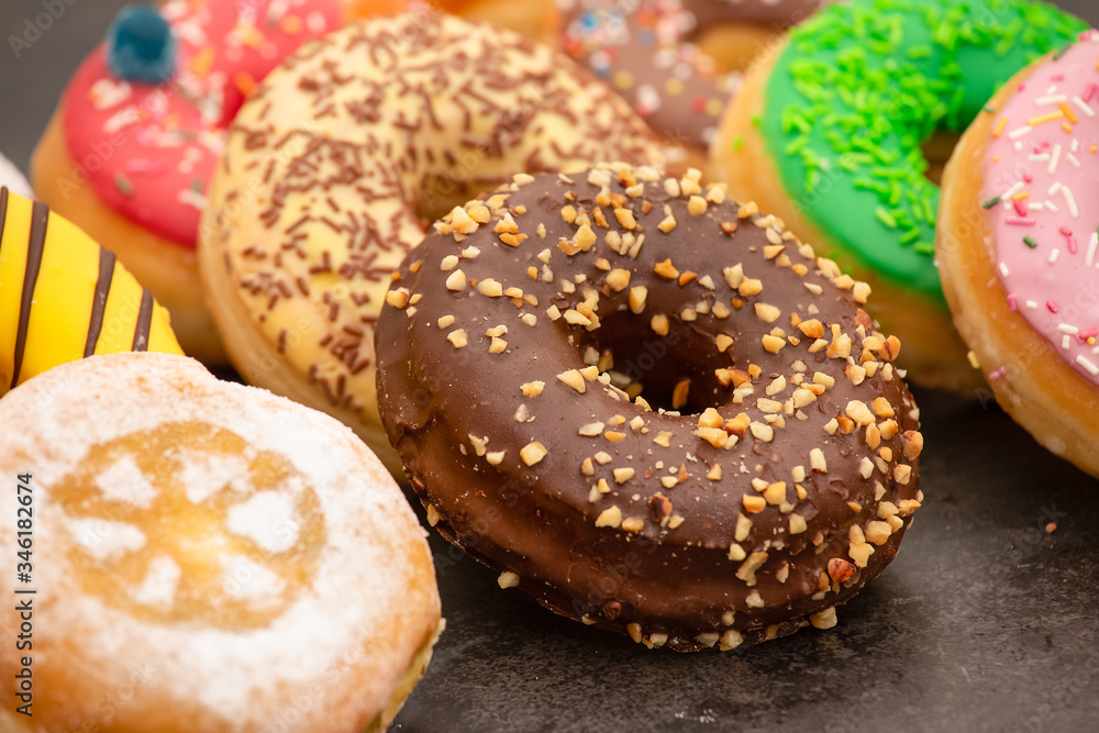 Dessert, Donuts, chocolate and strawberry circles, sugar and cream on Donuts and hot coffee cups, pr