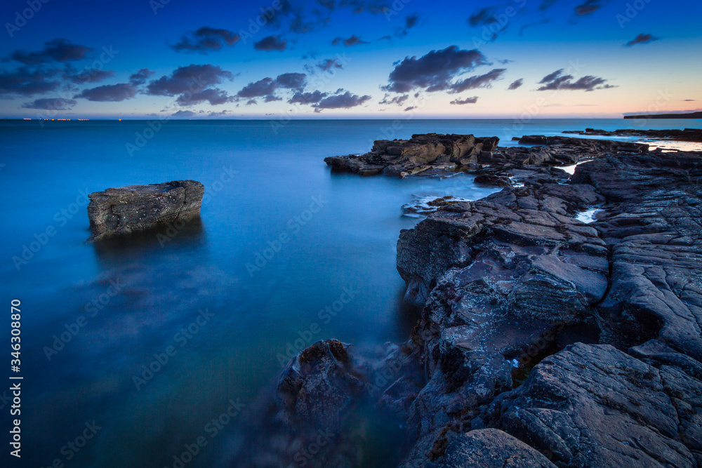 Beautiful scenery of the Atlantic ocean at dusk, Ireland