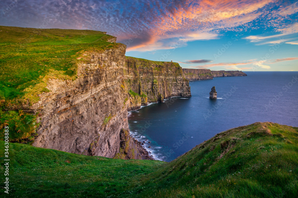 Amazing Cliffs of Moher at sunset in Ireland, County Clare.