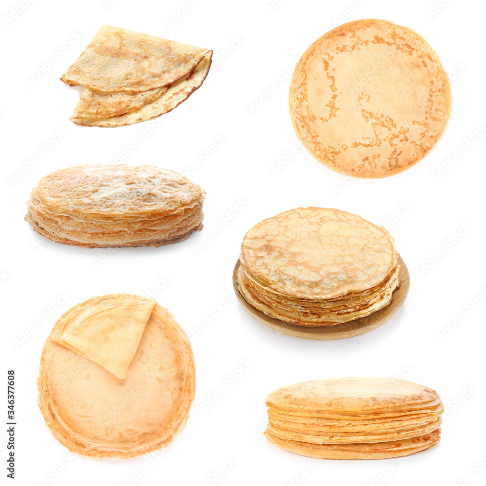 Set of tasty blini on white background