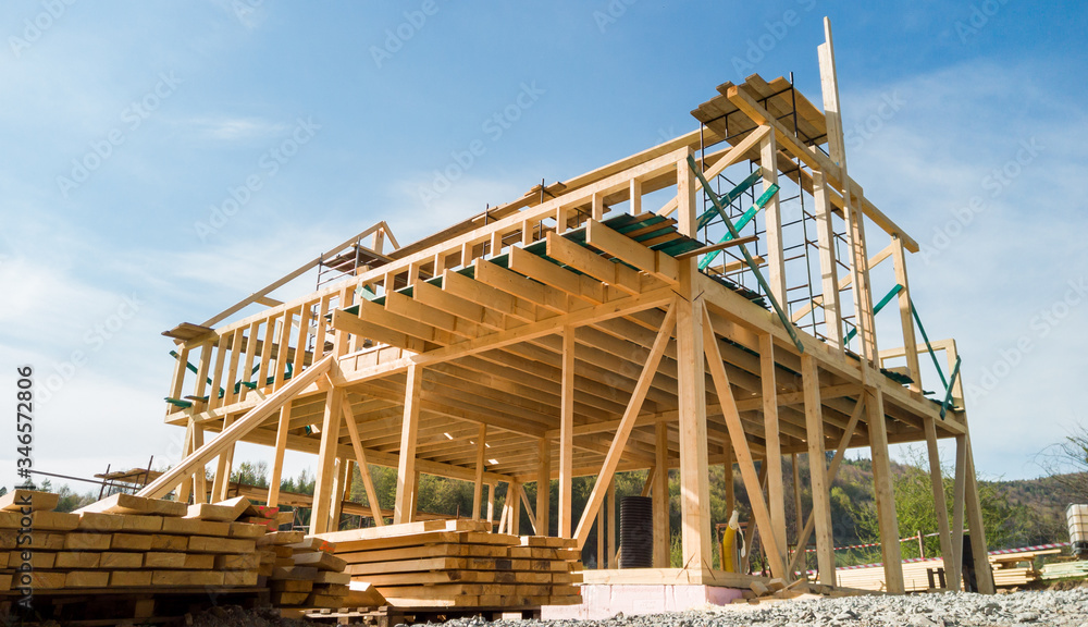 Framing of a new wooden house under construction