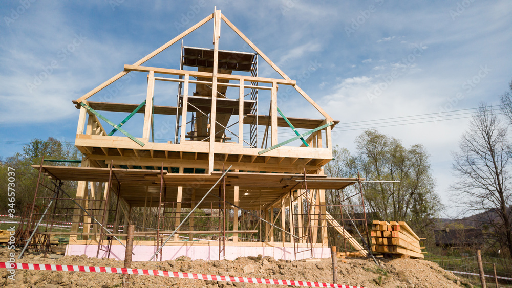 Framing of a new wooden house under construction