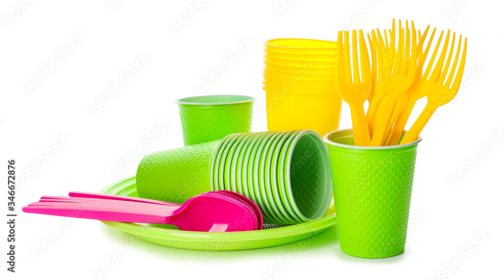 Set of plastic tableware on white background