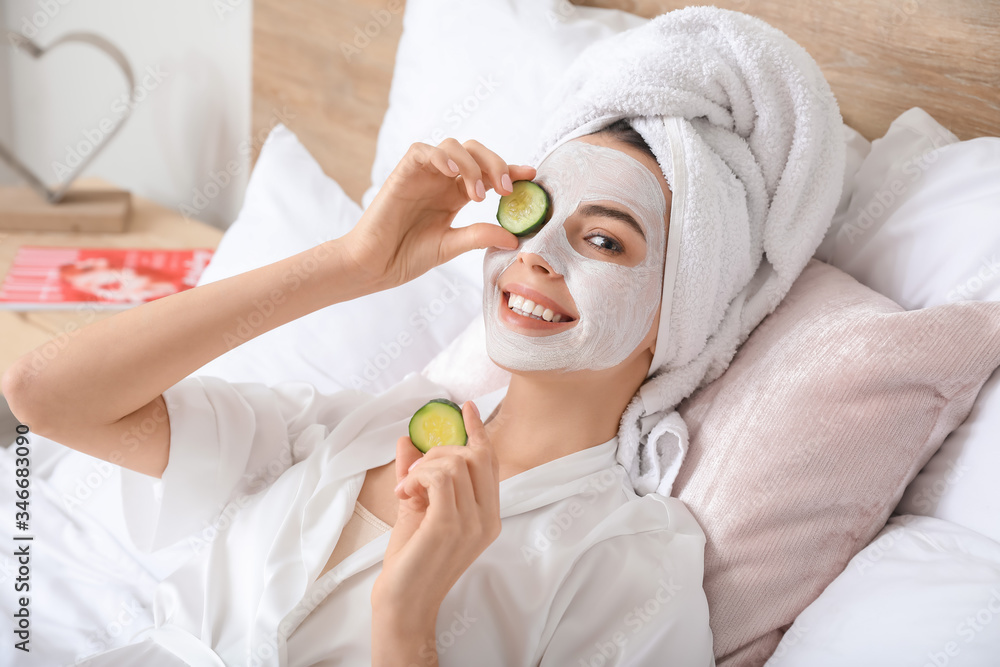 Morning of beautiful young woman taking care of her skin at home