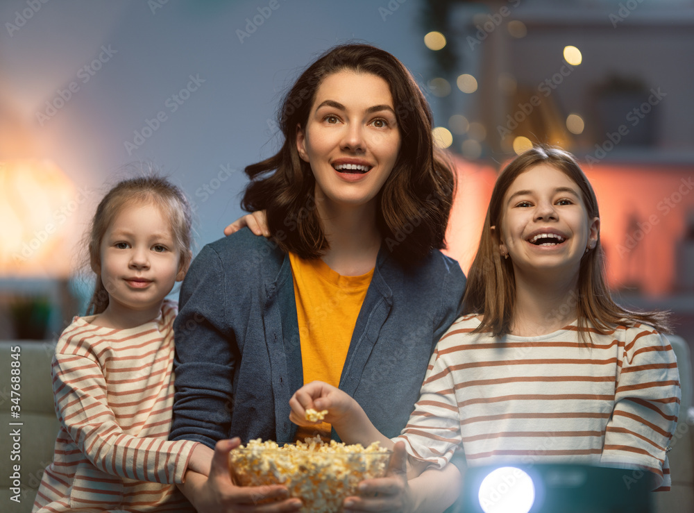 Mother and daughters spending time together.