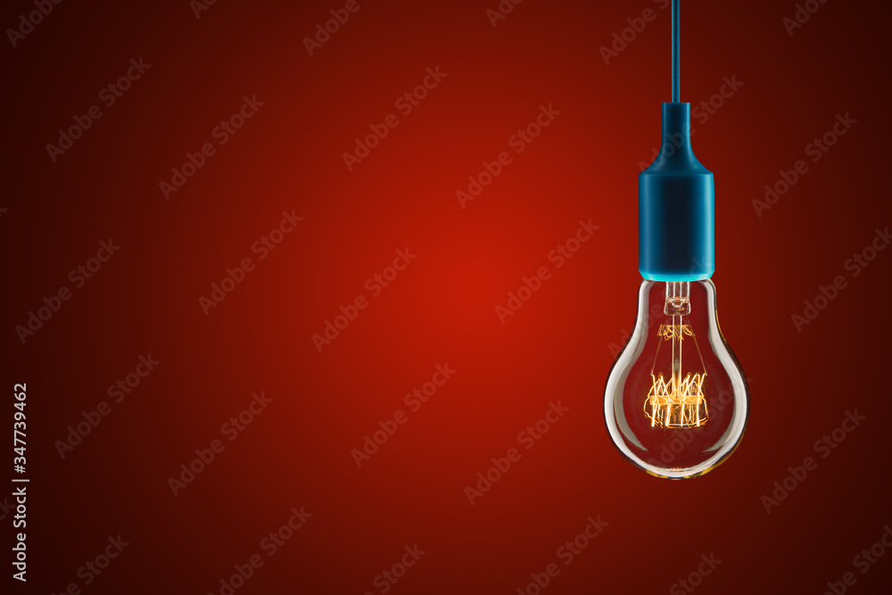 Idea and leadership concept - bulbs on the red background