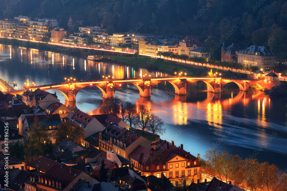 Heidelberg, Germany: night scene
of the Old Bridge on the Neckar river, aerial view 