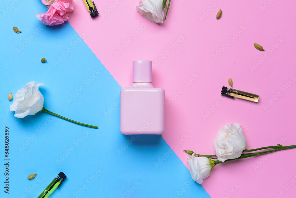 Beautiful composition with perfume bottle on color background