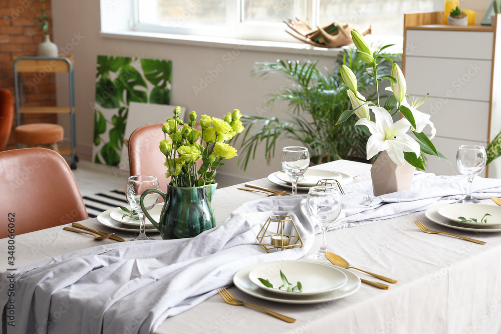 Served table in modern dining room