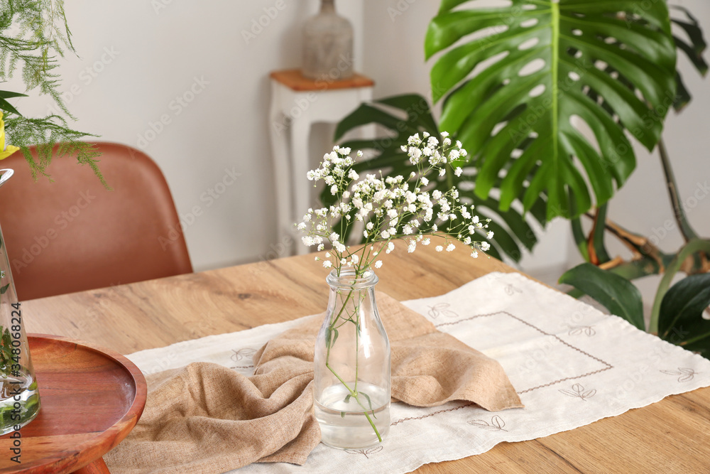 Floral decor on table in dining room