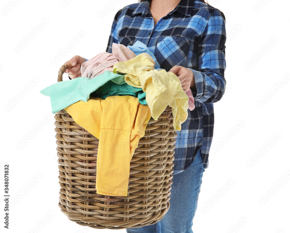 Woman with basket of laundry on white background