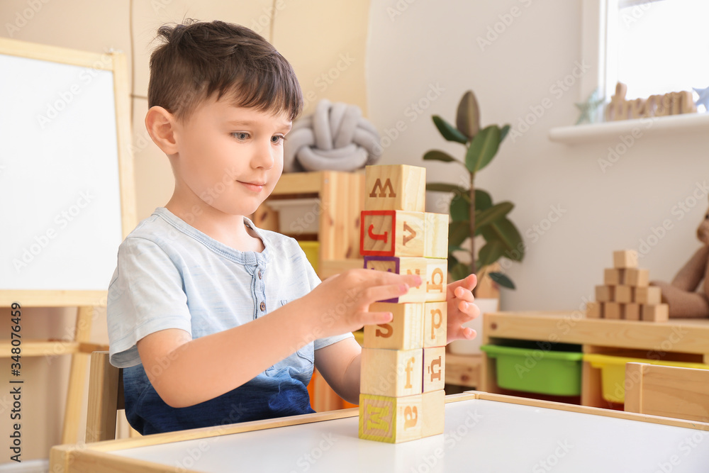 Little boy playing at home