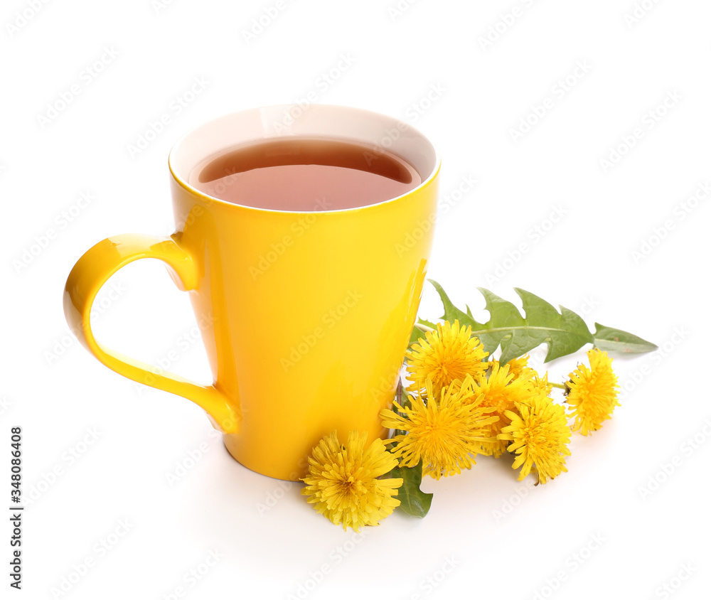 Cup of healthy dandelion tea on white background