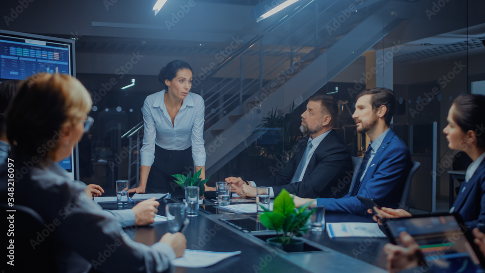 Late at Night in Meeting Room: Confident Female Executive Director Stands in the Head of the Confere