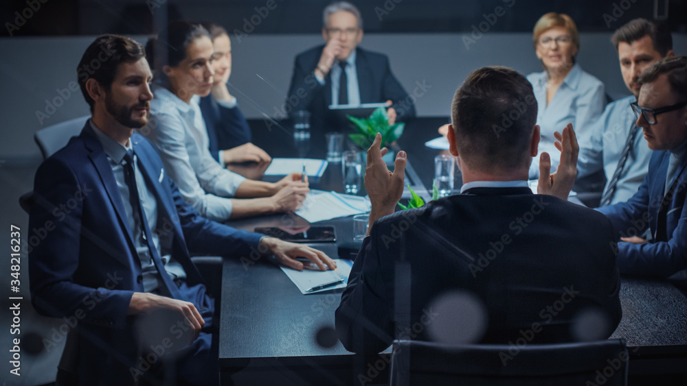 Late at Night In the Corporate Office Meeting Room: At Conference Table Executive Director Talks to 