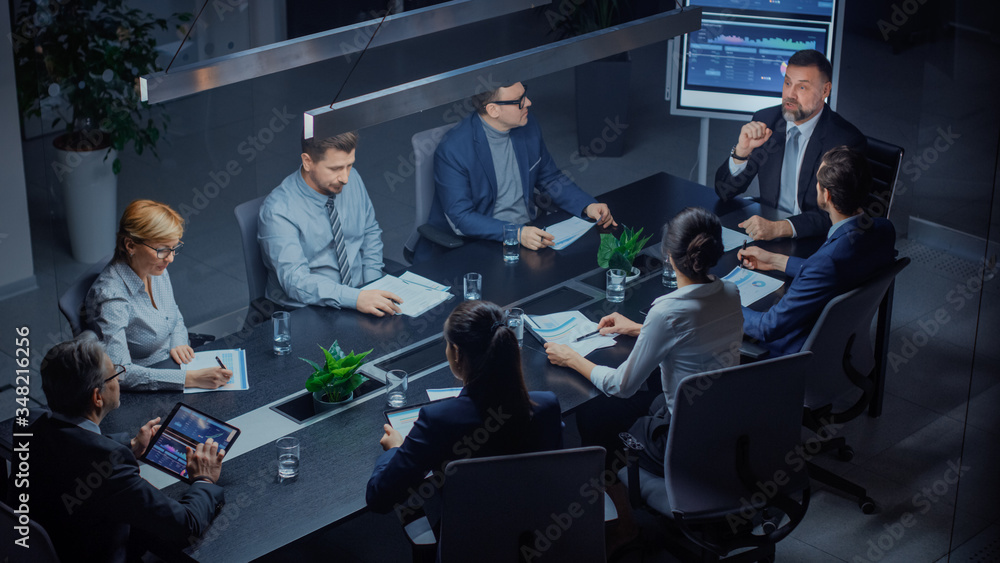 In the Corporate Meeting Room: Diverse Group of Business Associates and ExecutivesTalking, Negotiati