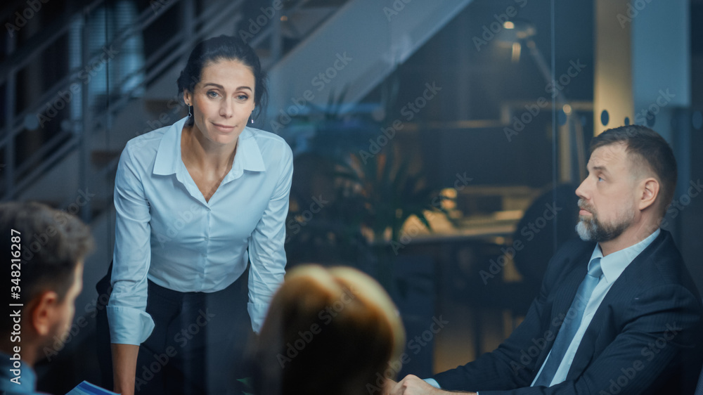 Corporate Meeting Room: Confident and Beautiful Female Executive Director Decisively Leans on the Co