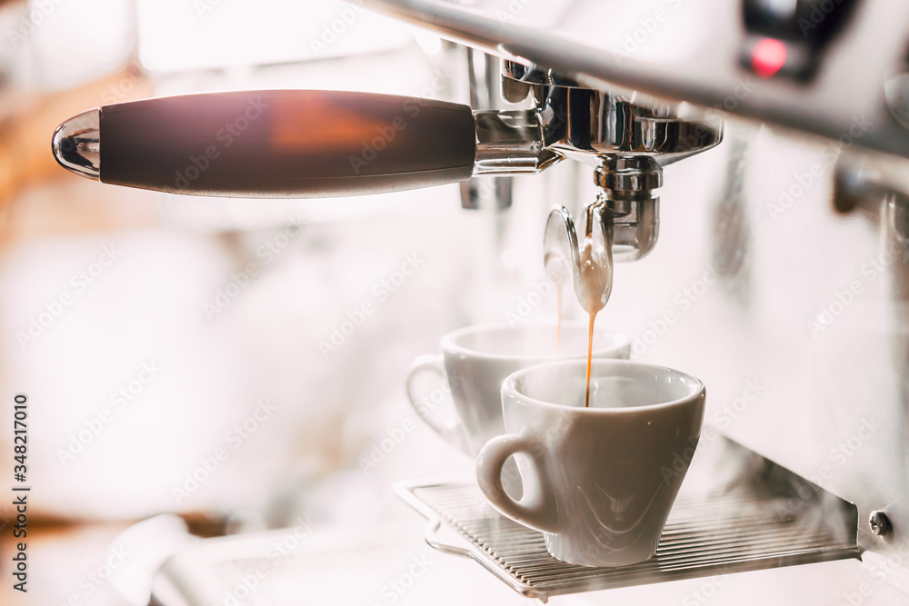 Making coffee in the coffee machine. Fresh espresso.