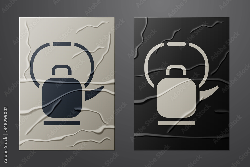 White Kettle with handle icon isolated on crumpled paper background. Teapot icon. Paper art style. V