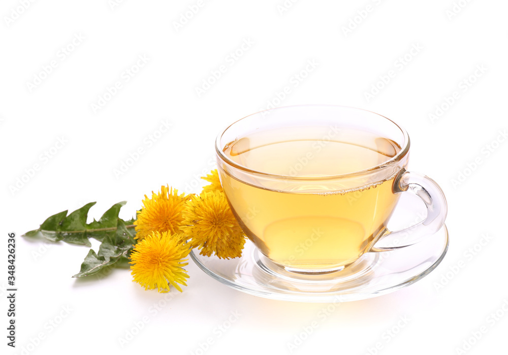 Cup of healthy dandelion tea on white background