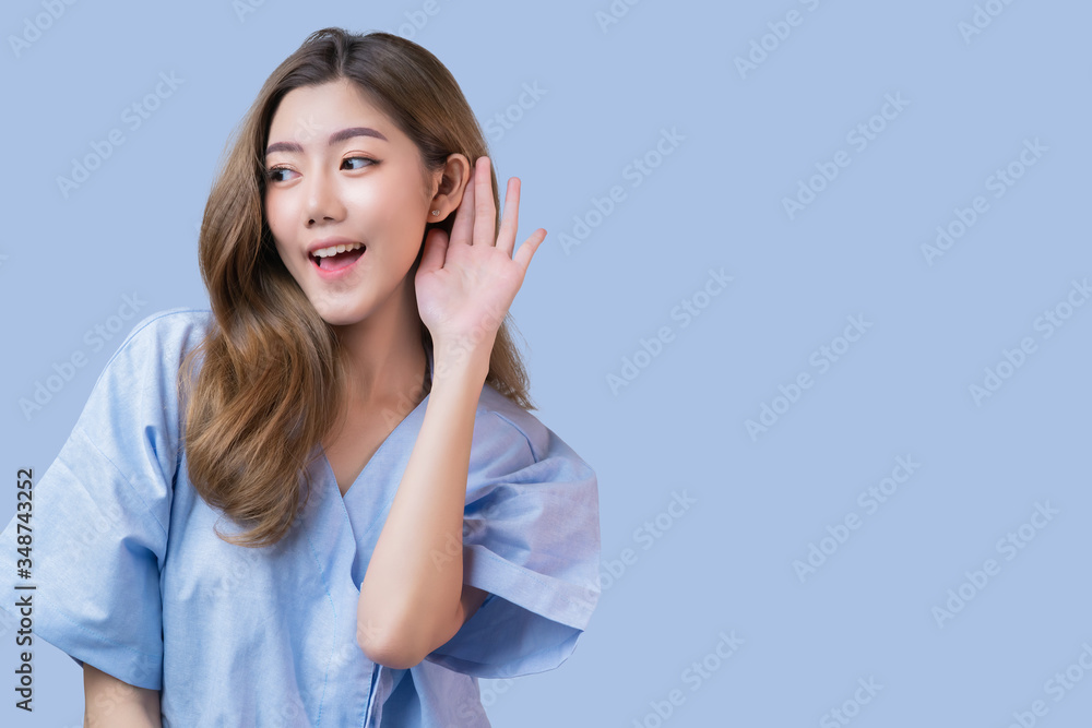 Goodnews gossip atttractive long hair asian female patient in hospital clinic uniform hand hold for 