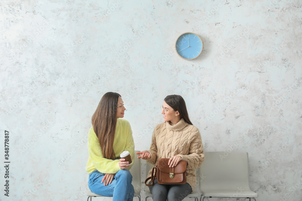 Women waiting in line indoors