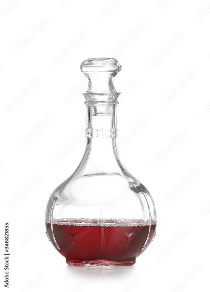 Decanter of wine on white background