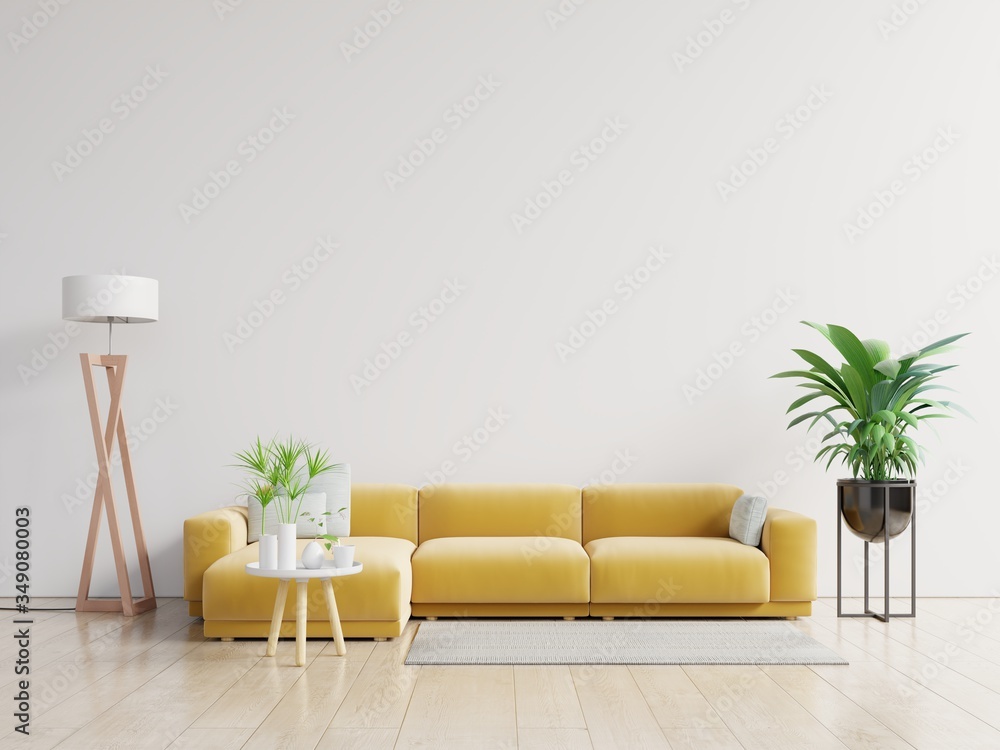 Empty living room with yellow sofa, plants and table on empty white wall background.