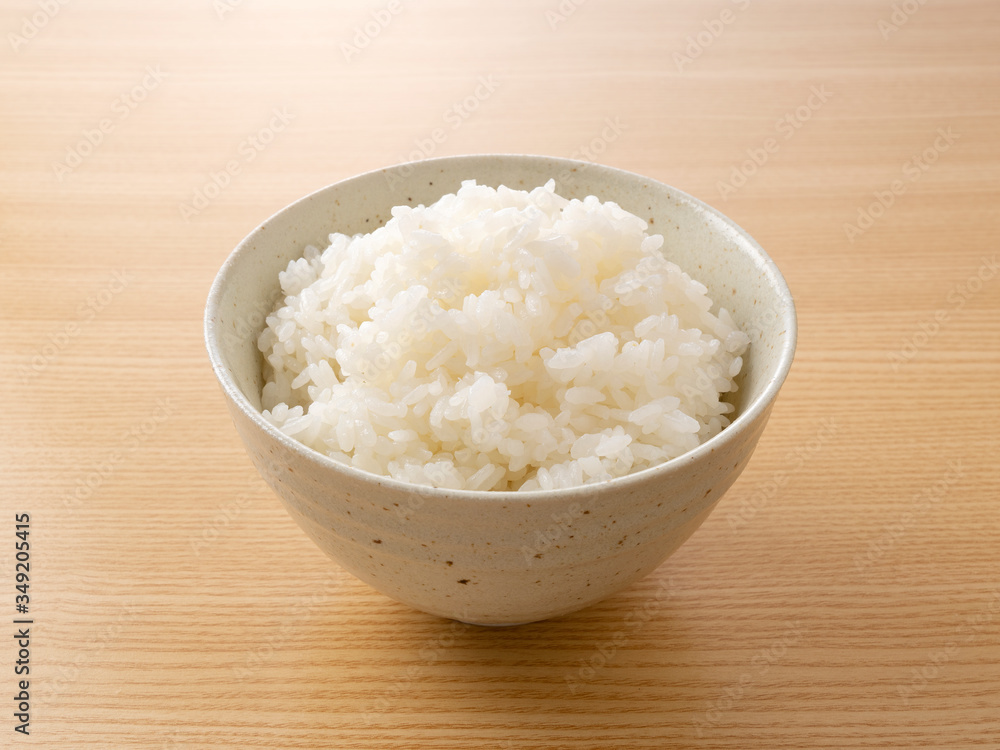 Rice on a wooden background