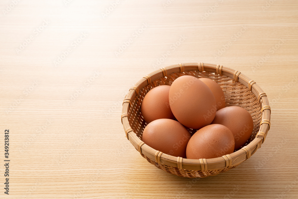 Eggs set against a wooden backdrop