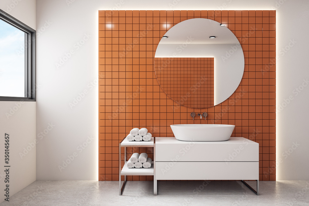 Modern orange bathroom with mirror