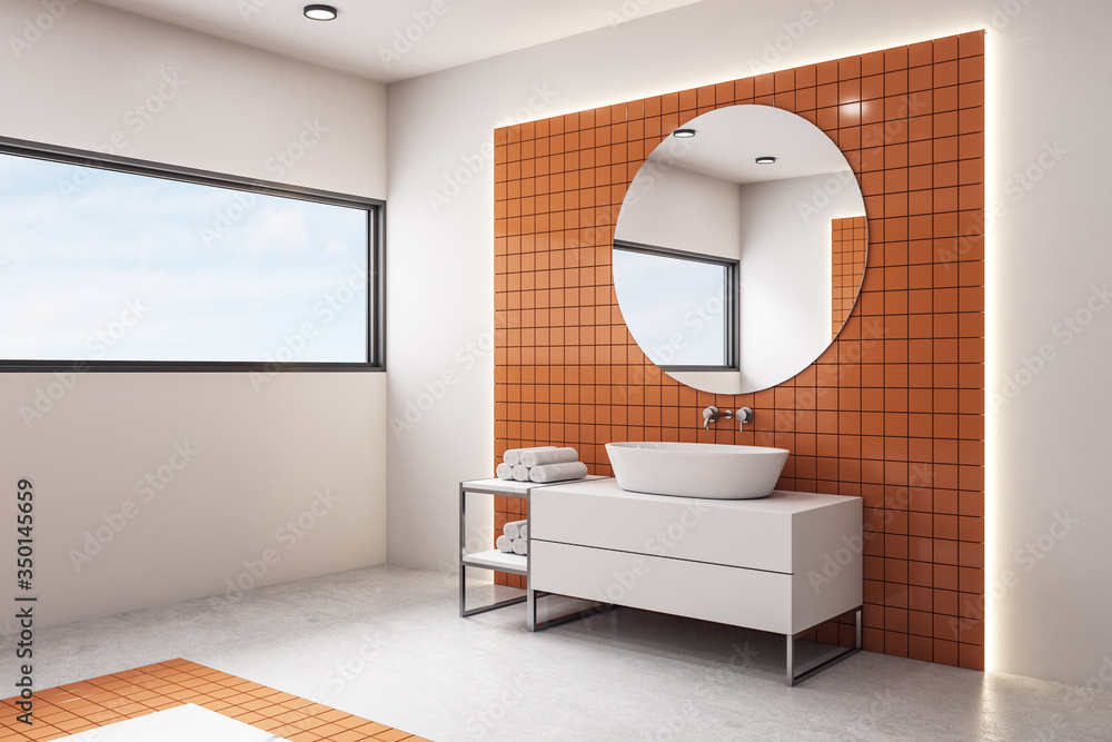 Luxury orange bathroom with mirror and bathtub