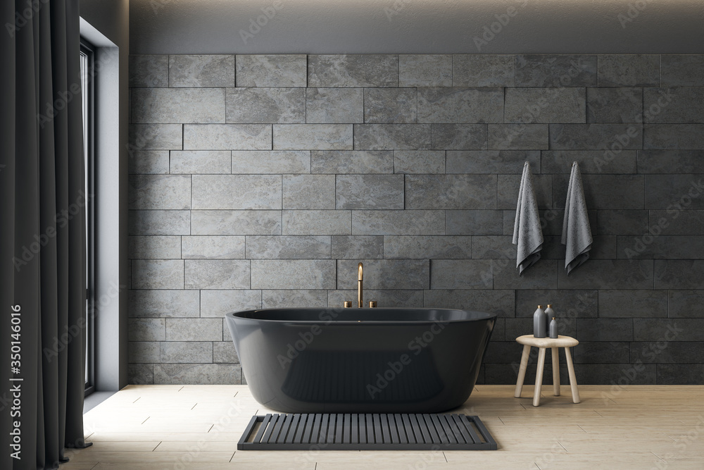 Minimalistic gray bathroom interior with decorative objects.