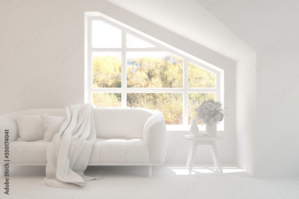 Stylish room in white color with sofa and autumn landscape in window. Scandinavian interior design. 