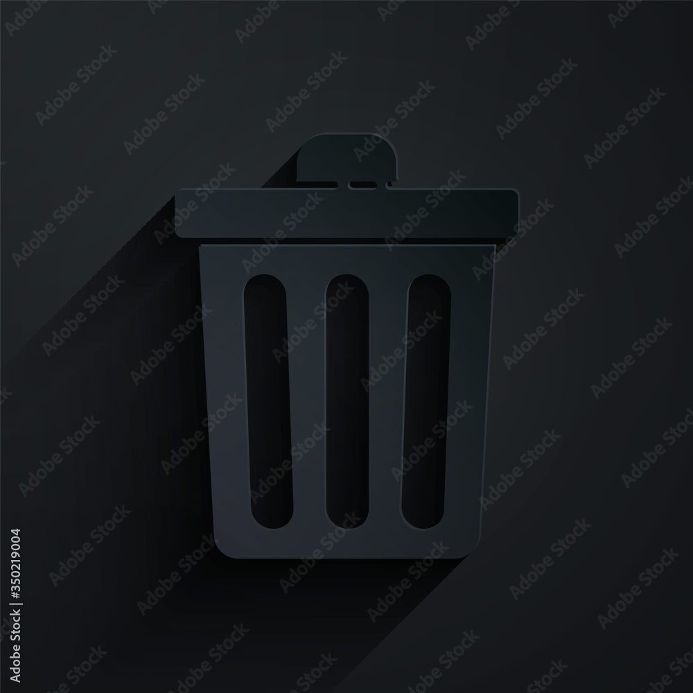 Paper cut Trash can icon isolated on black background. Garbage bin sign. Recycle basket icon. Office