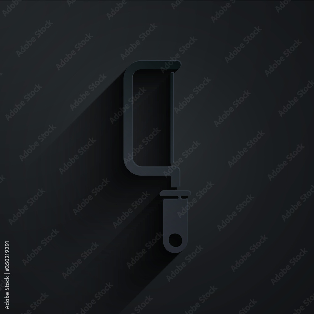 Paper cut Hacksaw icon isolated on black background. Metal saw for wood and metal. Paper art style. 