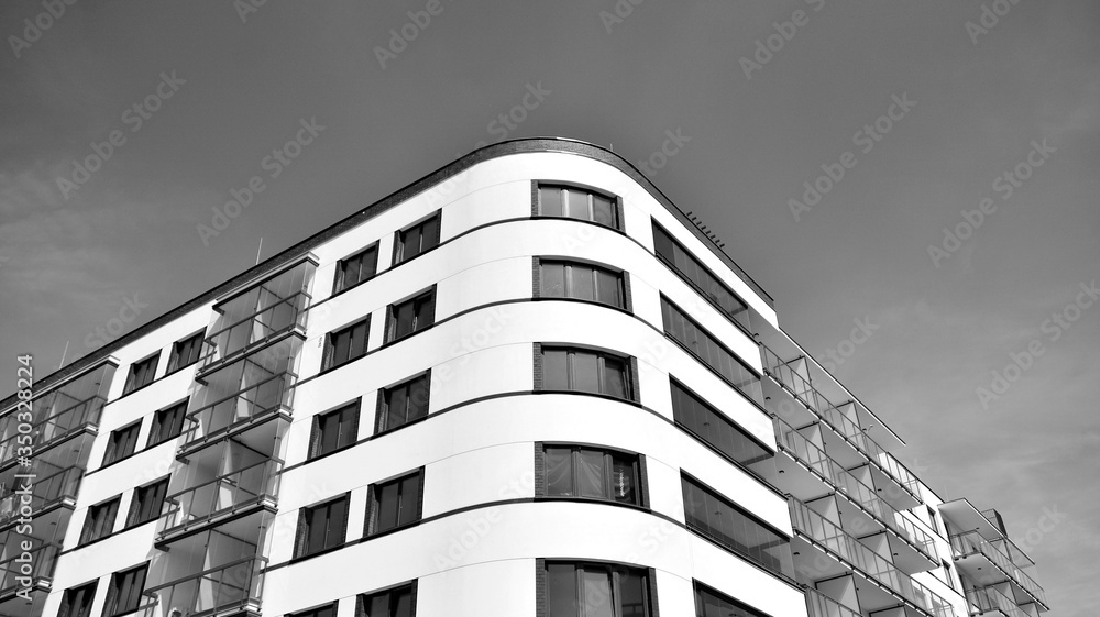 Detail of modern residential flat apartment building exterior. Fragment of new luxury house and home