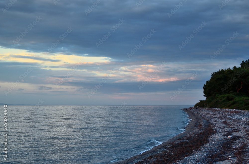 Cloudy sunset over the sea at Therma beach – Samothraki, Greece