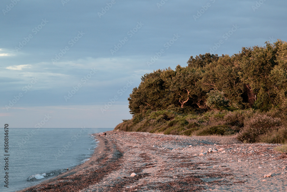 Cloudy sunset over the sea at Therma beach – Samothraki island, Greece, Aegean sea